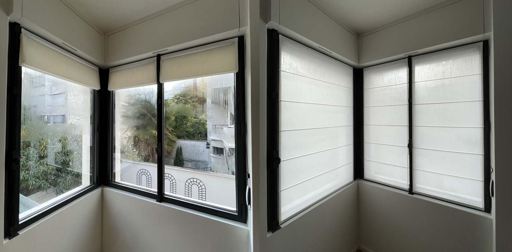 Roman blinds on corner windows. The advantage : glued systems without piercing.